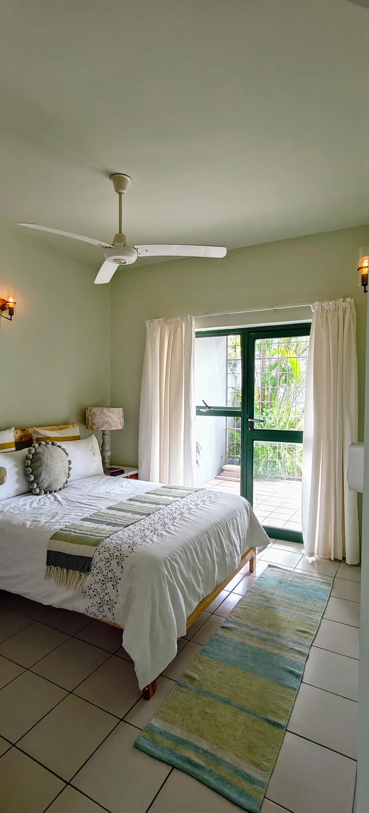 Bedroom with vertical garden view